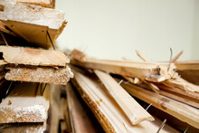 Broken Old Wooden Planks And Boards In Heap Of Construction Debris
