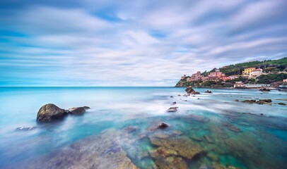 Wall Mural - Rocks and soft sea, long exposure photography landscape. Castiglioncello, Italy