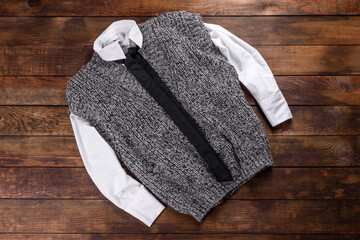 Knitted sweat made of woolen threads on a dark background