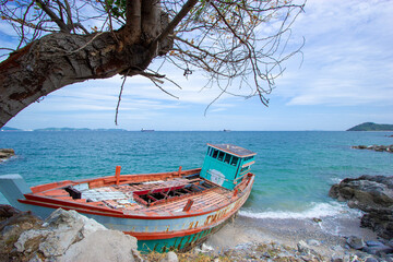 The wreck of a fishing boat landed on the shore, Koh Si Chang, Chonburi, Thailand