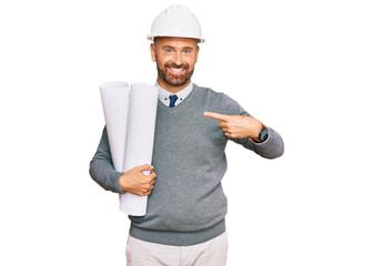 Poster - Handsome middle age man holding paper blueprints smiling happy pointing with hand and finger