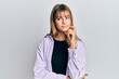© Krakenimages.com - Teenager caucasian girl wearing casual clothes thinking concentrated about doubt with finger on chin and looking up wondering