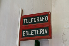 Old Sign In An Abandoned Train Station That Says: "telegraph" And "ticket Office"
