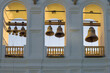 Bells on the ancient bell tower of the Tikhvin Assumption Monastery on December evening. Tikhvin, Leningrad region. Russia