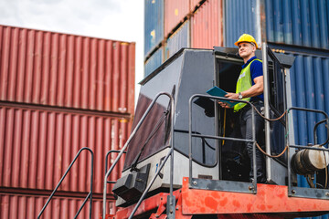 Wall Mural - Professional engineer container cargo foreman in helmets working standing and using walkie talkie checking stock into container for loading.logistic and business export