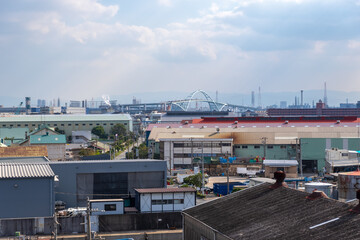 Wall Mural - 大阪市大正区の工場地帯とその先に見える新木津川大橋