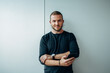 © Jacob Lund - Confident young business professional with phone