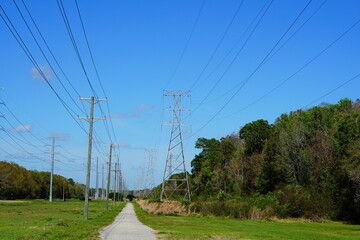 Wall Mural - High voltage electric power line and blue sky