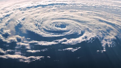 Wall Mural - a view from space of a large hurricane in the light of a moving sun. 3d animation. 4k. ultra high de