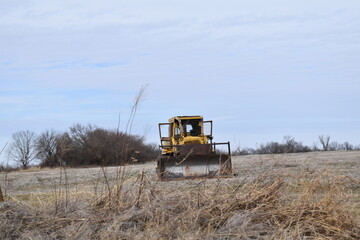 Canvas Print - Bulldozer in a Field