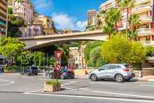 The colorful residential and commercial buildings rise above the streets of Monte Carlo Monaco near Sainte-Devote, part of the F1 grand prix racing circuit.