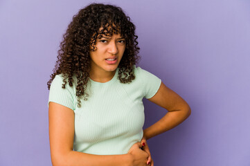 Poster - Young african american afro woman isolated having a liver pain, stomach ache.