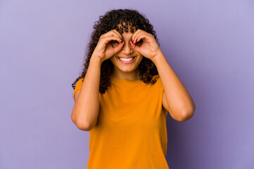 Wall Mural - Young african american afro woman isolated showing okay sign over eyes