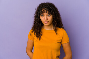 Wall Mural - Young african american afro woman isolated sad, serious face, feeling miserable and displeased.