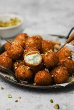 Fried Goat Cheese Balls With Pistachios And Truffle Honey
