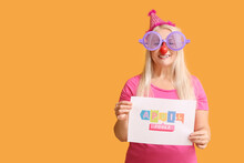 Mature Woman In Funny Disguise On Color Background. April Fools Day Celebration