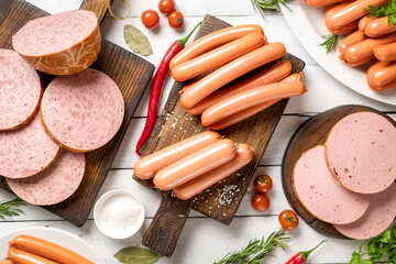 Wall Mural - Set of sausages on white wooden table top view