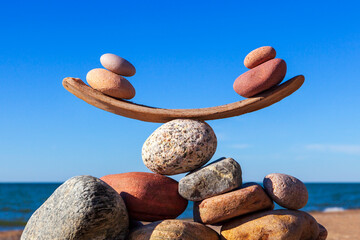 concept of life balance and harmony. Balance stones against the sea.