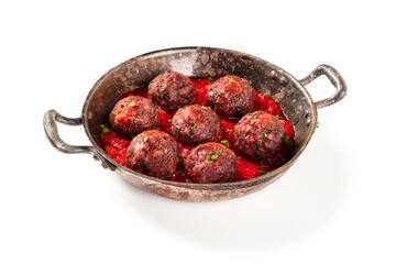 Meatballs with tomato sauce in a skillet on a white background