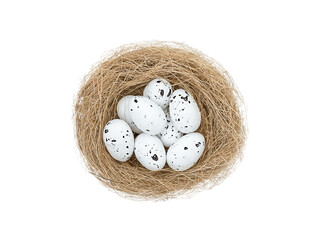 Easter white spotted eggs in bird's nest isolated on white background