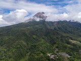 Fototapeta Góry - Aerial view of Mount Merapi Landscape with rice field and village in Yogyakarta, Indonesia Volcano Landscape View.