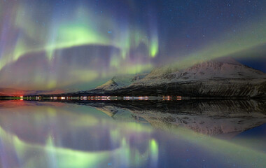 northern lights (aurora borealis) in the sky over tromso, norway