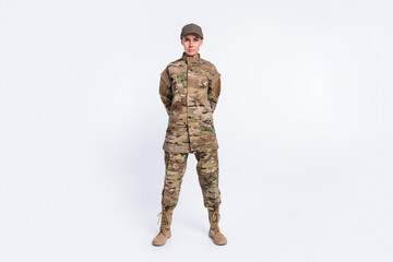 full body photo of young woman confident soldier officer army camouflage uniform isolated over white