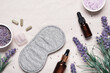 © colnihko - Sleep mask and lavender products for healthy sleep on textile background. Healthy night sleep concept