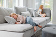 © Johnér - Toddler girl sleeping on sofa