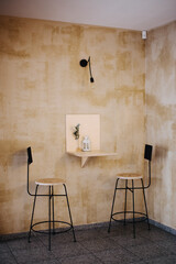 Coffee shop interior with two chairs on a light background