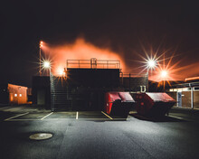 Large Garbage Containers At Night