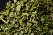 © Ingo Heddinga/Wirestock - Close-up shot of dry green tea