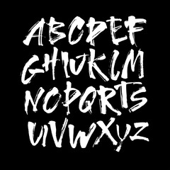 Wall Mural - vector acrylic brush style hand drawn alphabet font. calligraphy alphabet on a black background