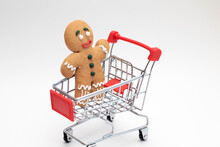 Happy Gingerbread Cookie In Toys Shopping Cart
