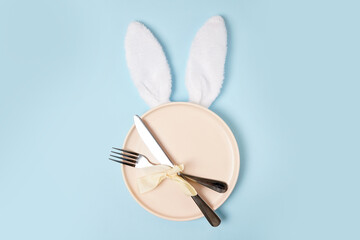 festive easter table setting with white easter bunny ears