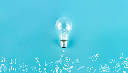 Wall Mural - Light bulbs on blue background, Business success, innovation and solution concept