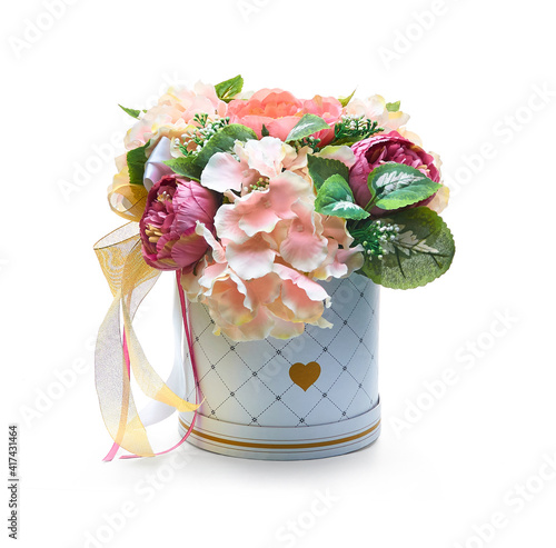 Flower arrangement in a cardboard white vase. Composition. © Andrey Zyk
