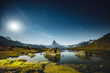 Wall Mural - famous peak matterhorn (cervino) under the starry sky. location place stellisee, switzerland, swiss 
