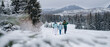 © Halfpoint - Family with small daughter on a walk outdoors in winter nature, Tatra mountains Slovakia.