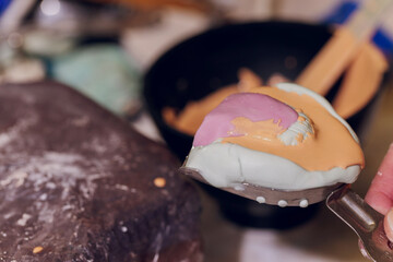 The process of making a dental prosthesis in a dental laboratory.