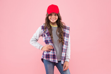 Wall Mural - happy teenager girl with hipster look in cap and jacket, fashion