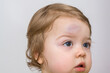 © Alina - A large bump on the child's forehead. Baby bruises concept