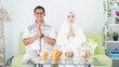 © HumbaFrame - couple celebrate Eid together while enjoying with apology gestures