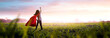 © Jess rodriguez - girl dreaming about superhero in a beautiful field