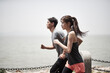 © imtmphoto - young asian man and woman running outdoors
