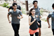© imtmphoto - group of young asian adults running outdoors