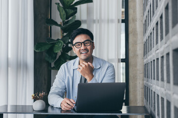 asian man work using computer hand typing laptop keyboard contact us.student study learning education online.adult professional people chatting search at office.concept for technology device business