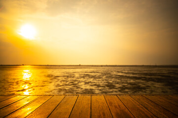 Canvas Print - The wood floor extends into the sea when the water drops