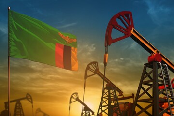 Wall Mural - Zambia oil industry concept. Industrial illustration - Zambia flag and oil wells against the blue and yellow sunset sky background - 3D illustration