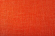 Close up photo of orange cloth texture.